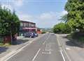 Lorry and car crash near shops