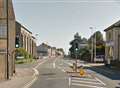 Woman robbed of handbag as she sat in car