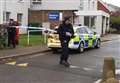 Woman dies in tower block garden