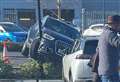 Audi stuck up lamppost in car park