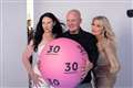 Lottery winners snapped by celebrity photographer for 30th anniversary