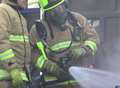 Crews tackle oven fire