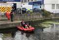 Police search river in murder probe