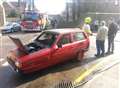 Reliant Robin alight near Maidstone town centre