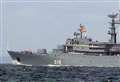 Russian warship shadowed as she sails close to coast