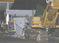 Mechanical digger used in filling station ram-raid