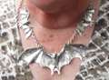 Bat necklace among valuables stolen in burglary