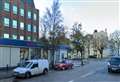 Three arrests as biker taken to hospital after crash near Tesco