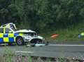 Police officer still in hospital after M2 crash