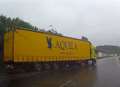 VIDEO: Lorry swerves into path of traffic in heavy rain