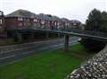 Woman dangled by hair after leaping from bridge