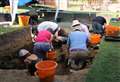 Dig volunteers raise a glass to Saxon finds