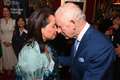 King shares traditional greetings with Maori attendee at charity launch