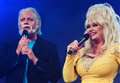 Dolly impersonator upset by 'extremely aggressive' country music fans