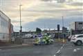 Road closed after car crashes into lamppost