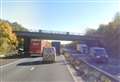 Car windscreen smashed after object thrown from M26 bridge