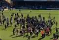 Football 'hooligans' charged after pitch invasion