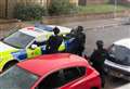 Armed police outside flats 