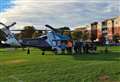 Doctors rush through town as air ambulance lands in park