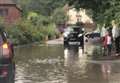 Parents forced to wade through 'stinking lake' outside school