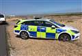 Police 'shingled out' as car stuck on beach