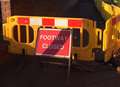 'Leaning' wall knocked down on busy road