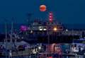 Photo of Strawberry Moon over harbour