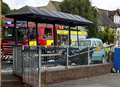 Three taken to hospital after car smashes into bus stop