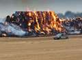 Firefighters leave large haystack to burn