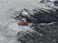 Dog rescued by lifeboat after cliff fall