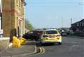 Car hits house on corner of road