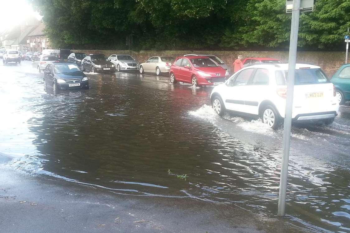 The flooded New Romney High Street today.