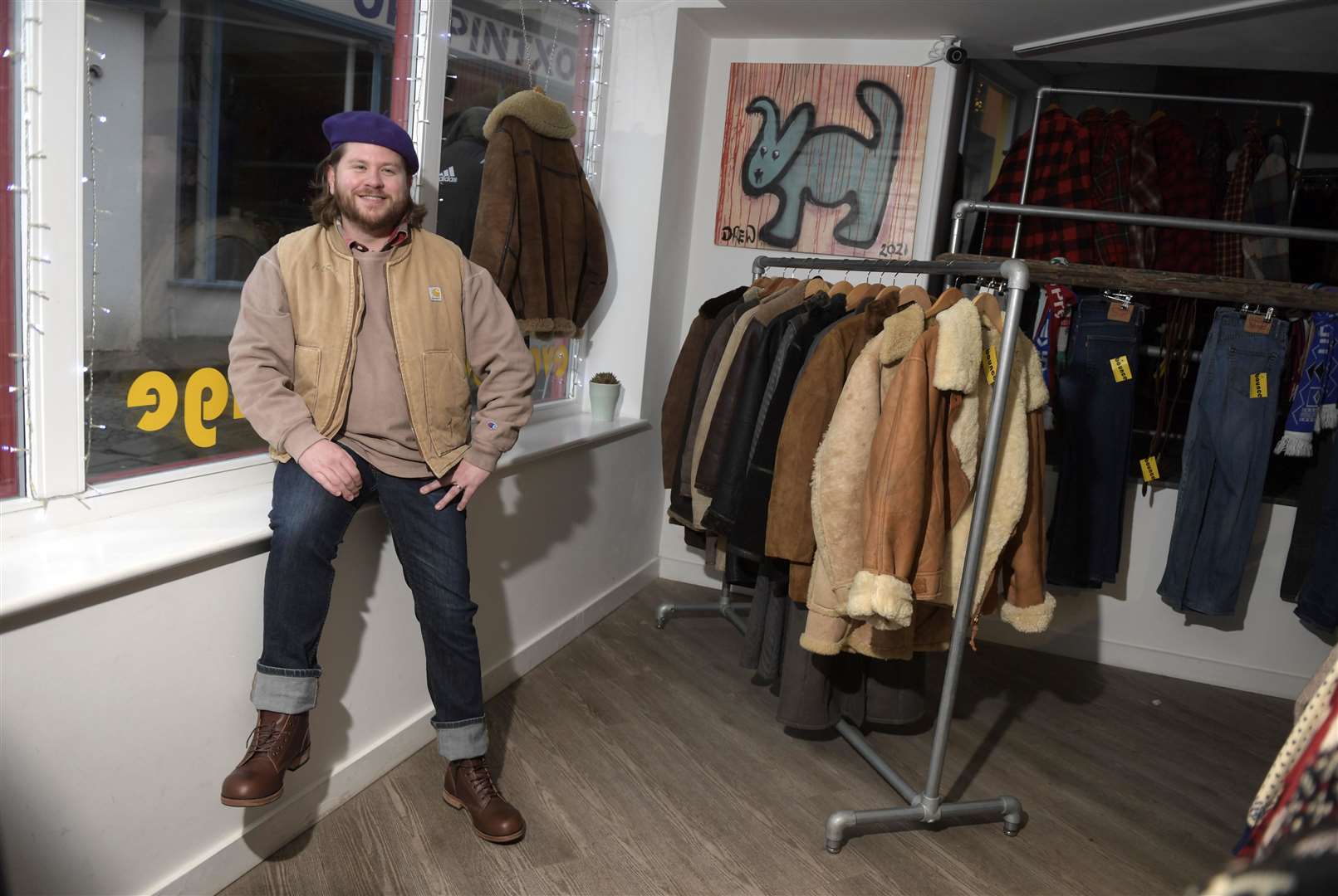 Rhys models an outfit featuring popular workwear items. Picture: Barry Goodwin