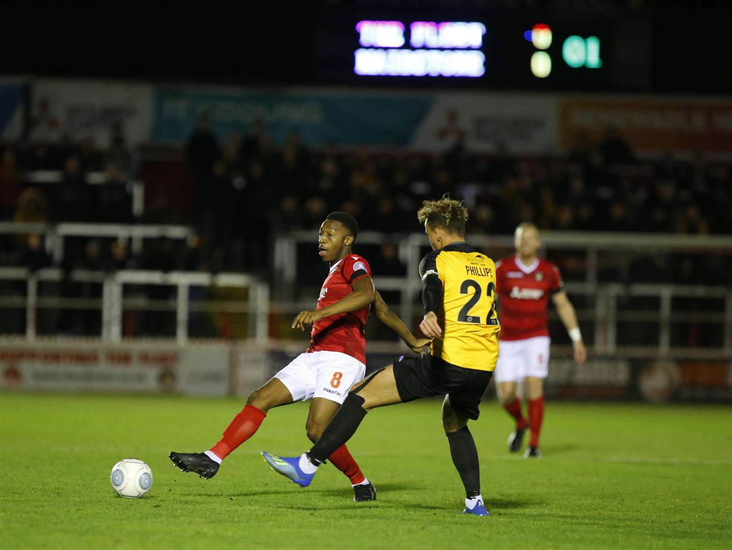 Ebou Adams up against Michael Phillips in midfield Picture: Andy Jones