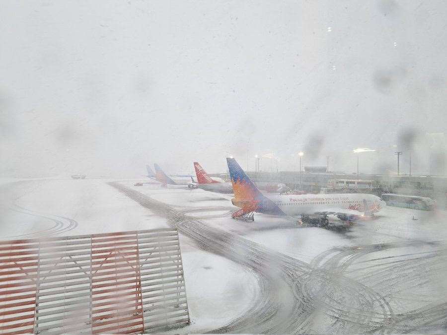 Passenger Richard Green said the runway at Newcastle International Airport was covered in a blanket of snow (Richard Green)