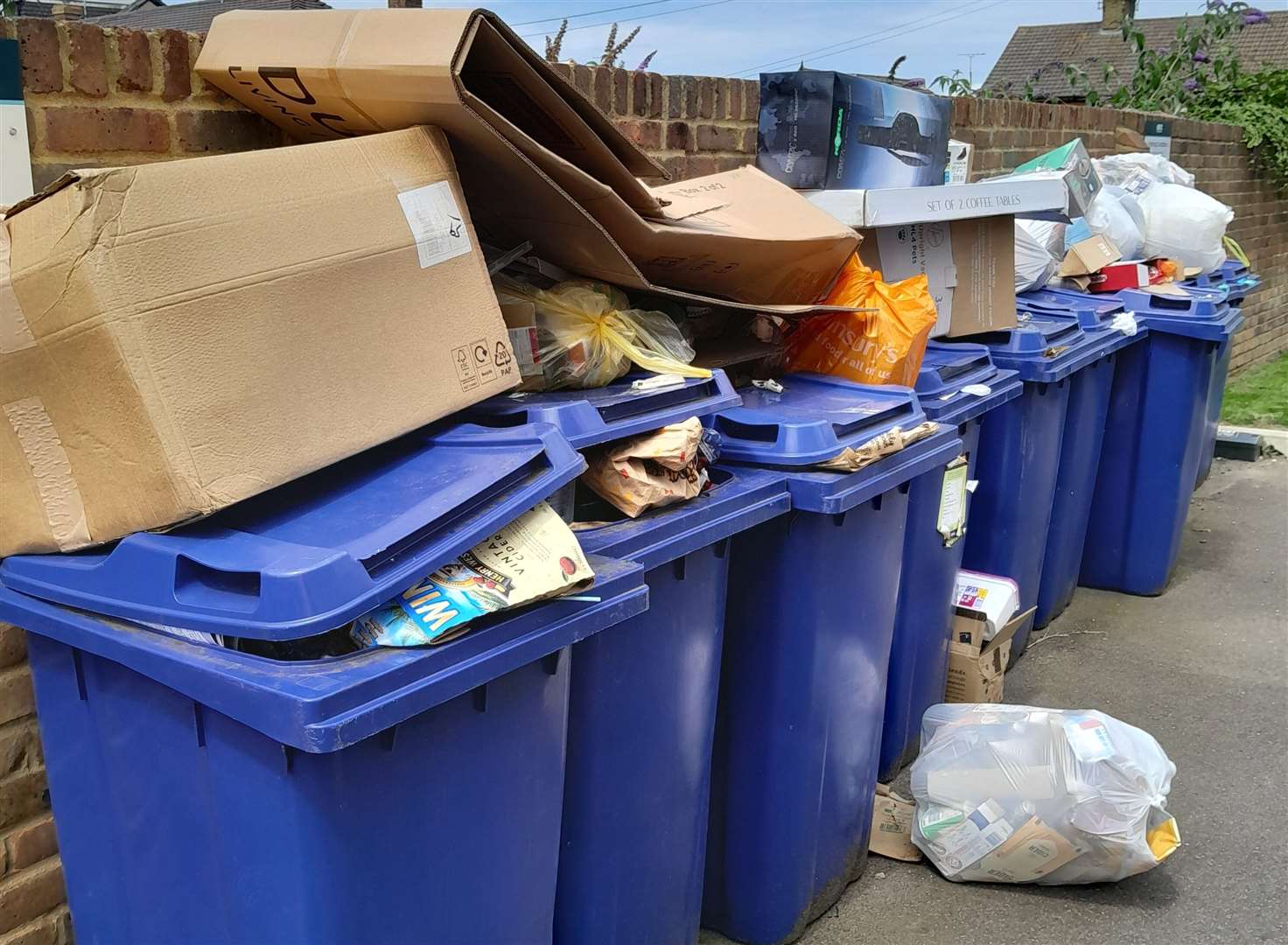 The recycling bins at Clarity Mews in London Road in Sittingbourne overflowing. Picture: Vince Kindlin