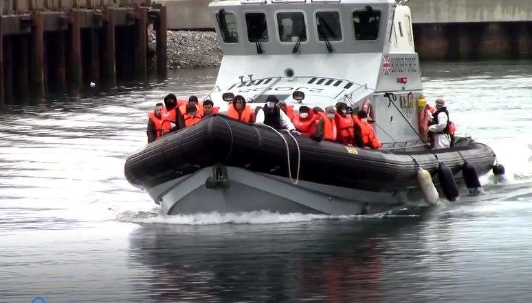 People arrive in Dover on board Border Force boat. Photo: Chris Johnson