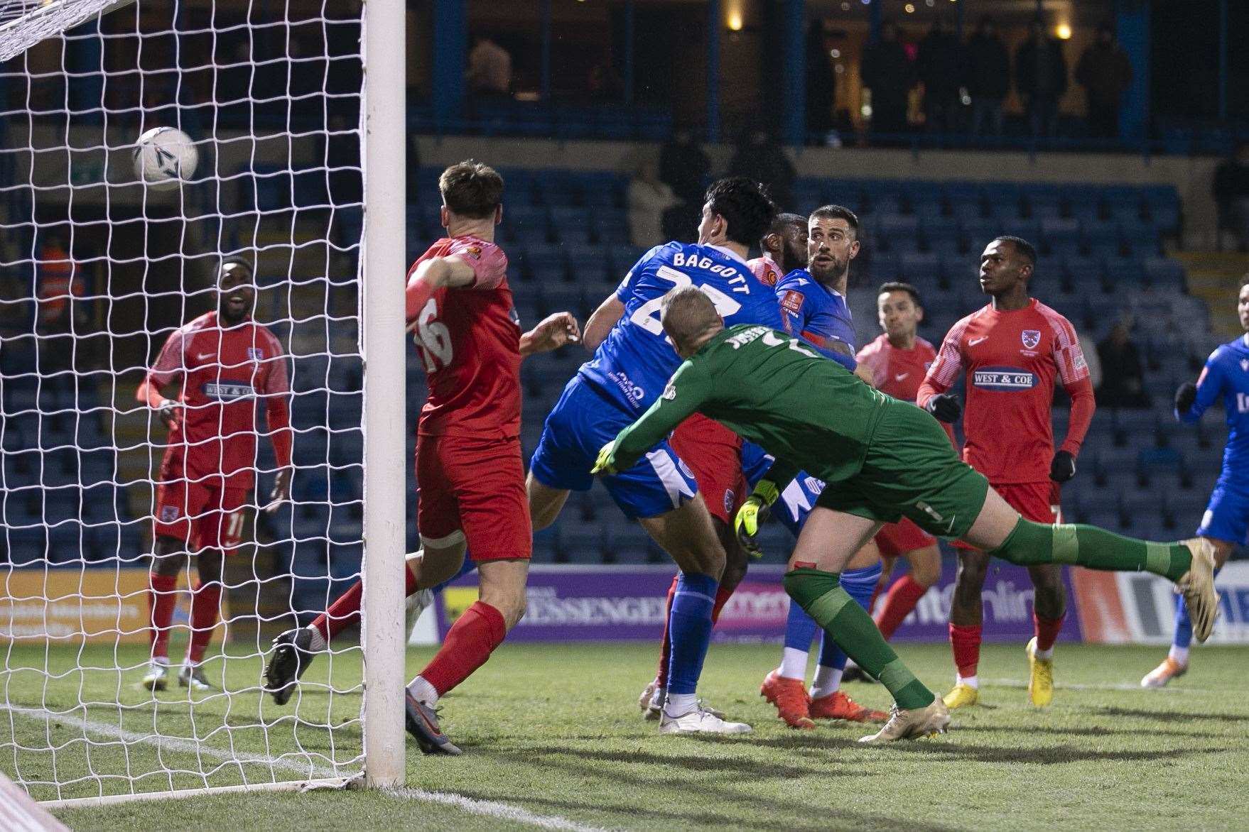 Elkan Baggott scores for Gillingham in the FA Cup against Dagenham