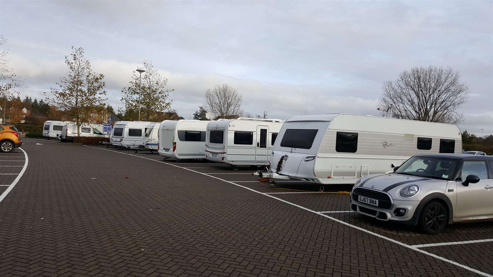 About 12 caravans have pitched up in the car park