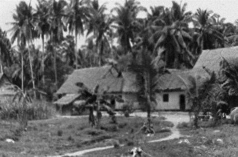 Singapore in Robin Kenworthy's days, with many building roofed in atap thatch