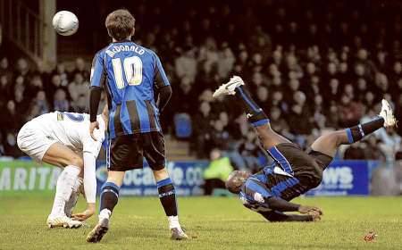 Adebayo Akinfenwa executes a spectacular overhead kick as Gillingham try to break the deadlock against Oxford