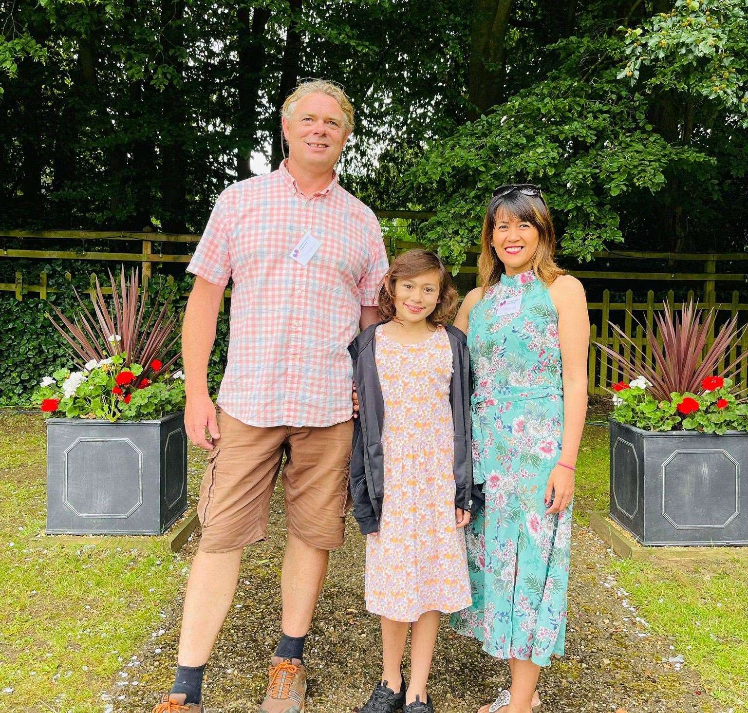 The youngster with her dad Terry and mum Dellanie, who have launched a fundraiser