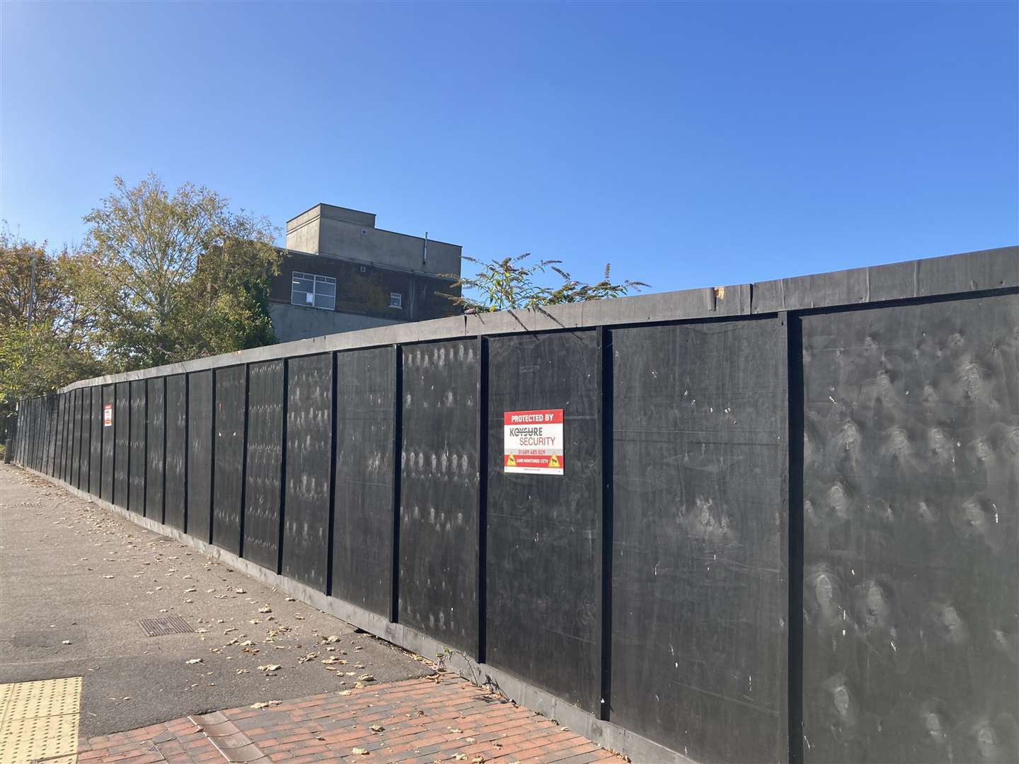 Hoardings in Bell Road, Sittingbourne, hide what is going on, or not, on the site of the former Bell shopping centre. Picture: John Nurden