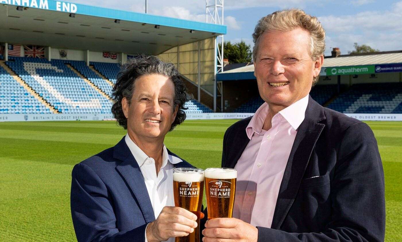 Jonathan Neame and Brad Galinson celebrate a new partnership earlier this year