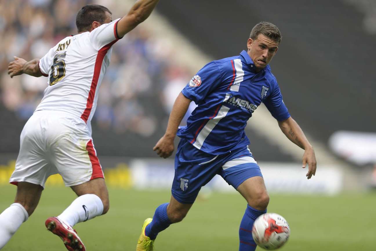 Cody McDonald in action before his injury at MK Dons Picture: Barry Goodwin