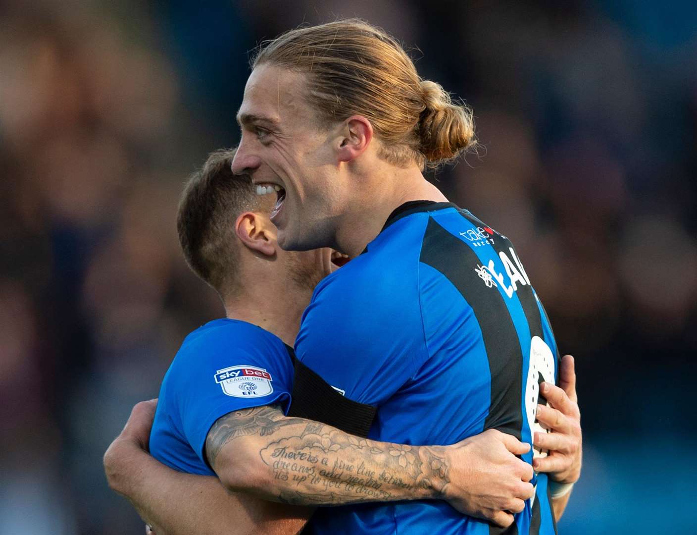 Tom Eaves celebrates scoring Gillingham's second goal with Mark Byrne Picture: Ady Kerry