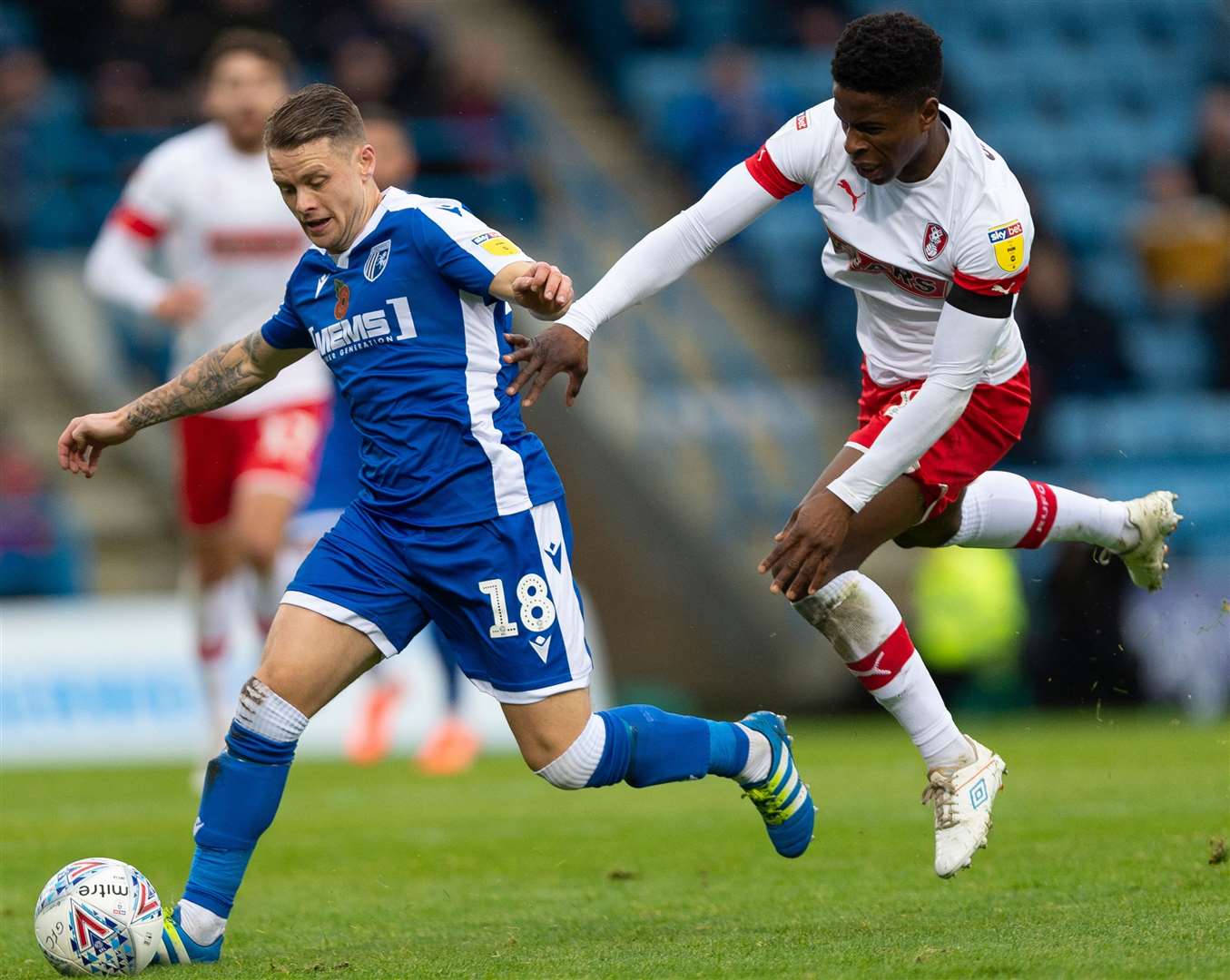 Mark Byrne holds off a flying challenge from Rotherham's Chiedozie Ogbene Picture: Ady Kerry