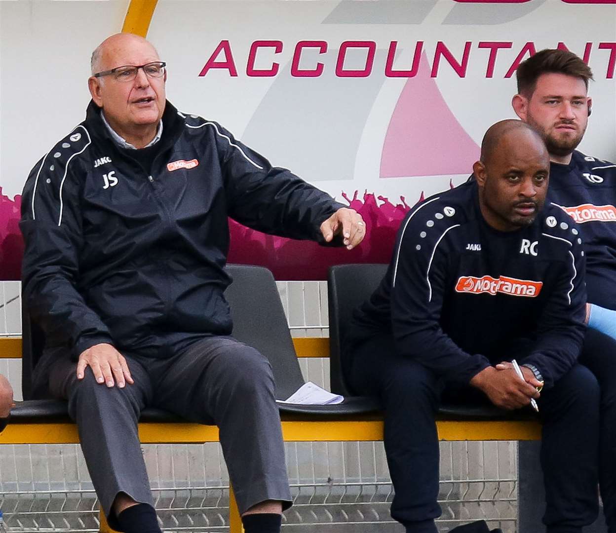 Ryan Gordon on the bench with John Still at Maidstone Picture: Matthew Walker