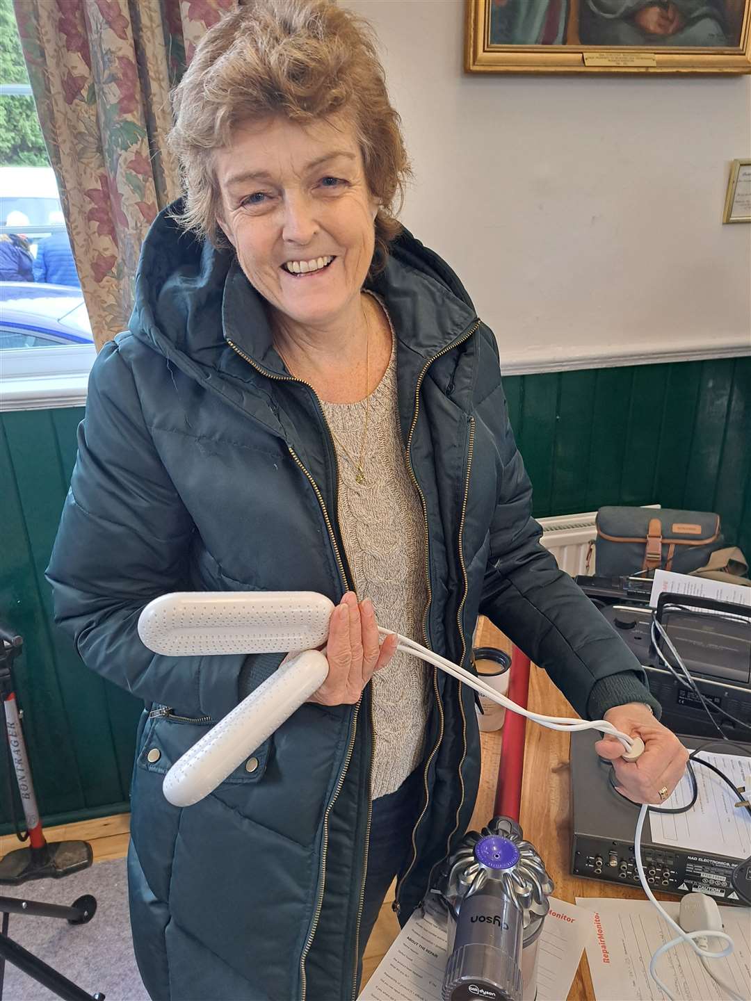 Cllr Valerie Springett with her boot warmers that had stopped working