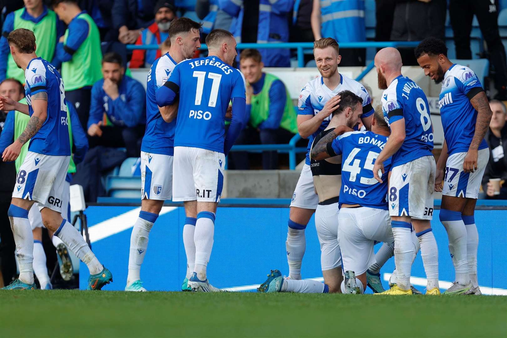 Scott Malone is congratulated by his Gillingham team-mates after scoring Picture @Julian_KPI